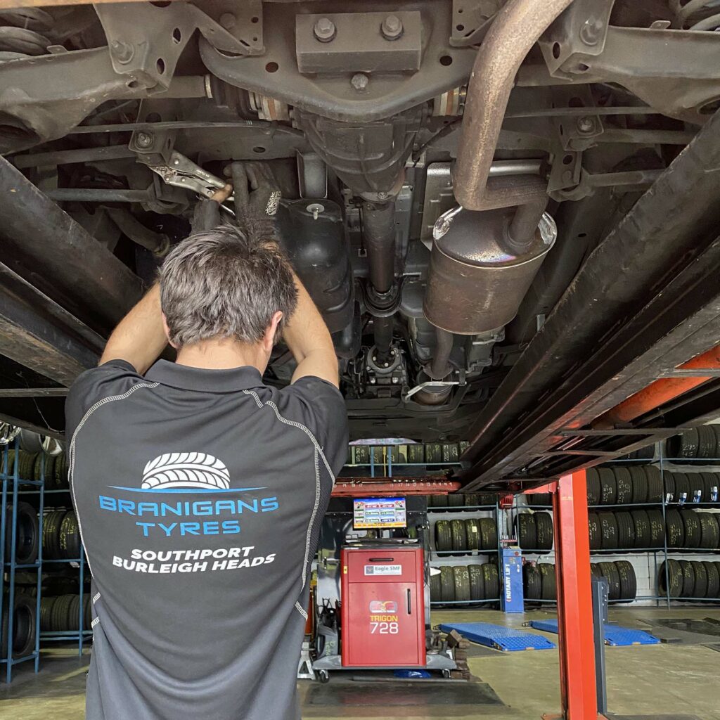 Wheel alignment being done at Branigans Burleigh Heads branch in the Gold Coast.