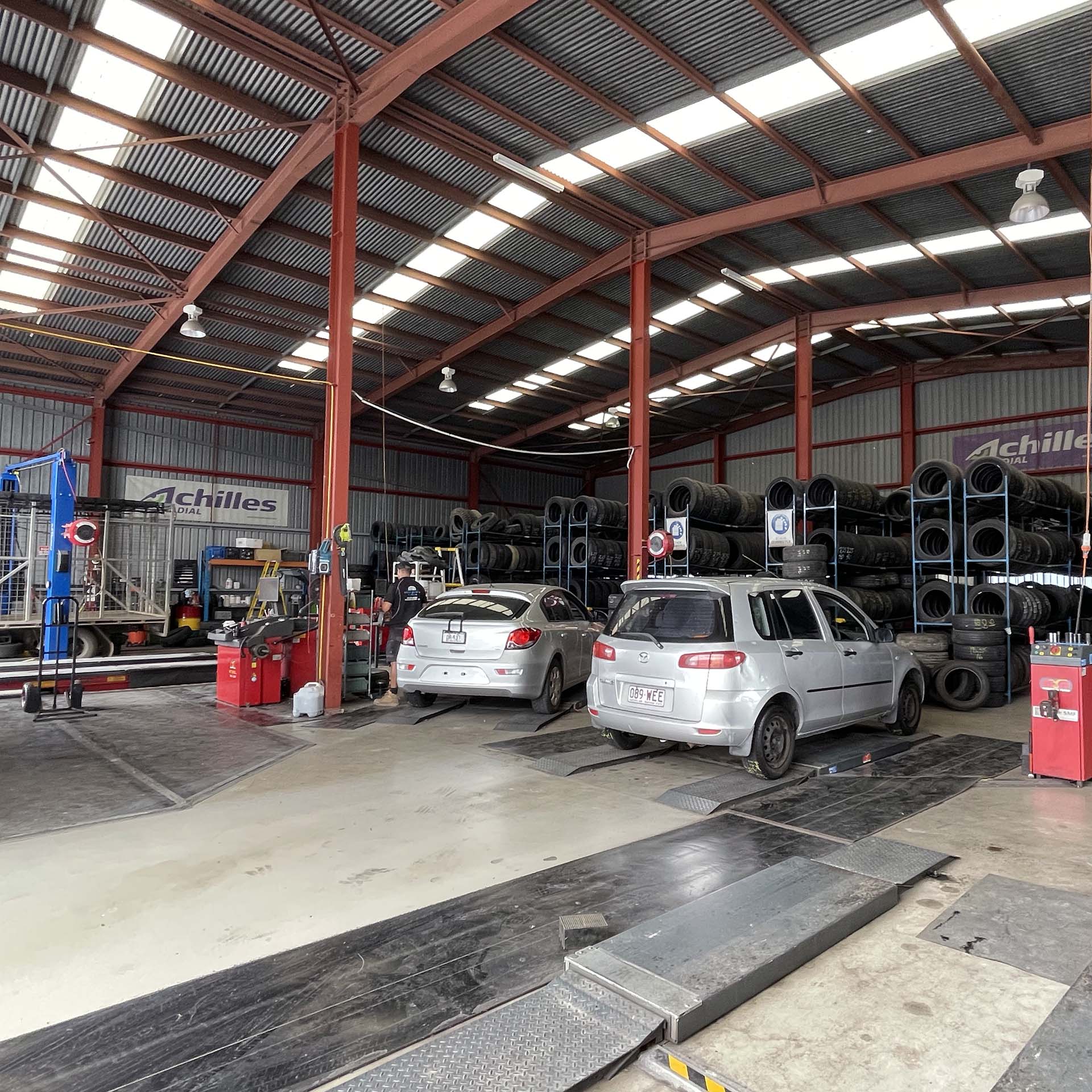 Cars waiting for replacement tyre at the Branigans Southport tyre shop in the Gold Coast.