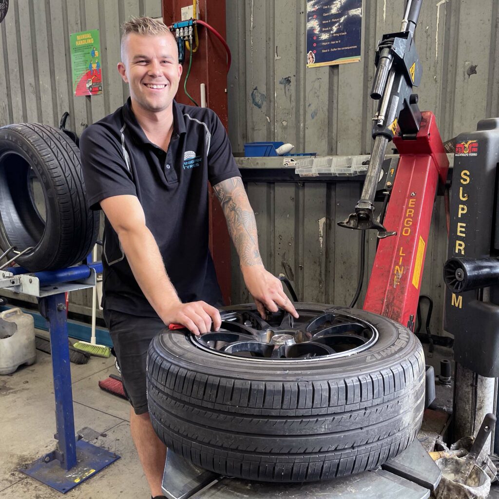 Staff member at the Branigans Southport tyre shop in the Gold Coast.